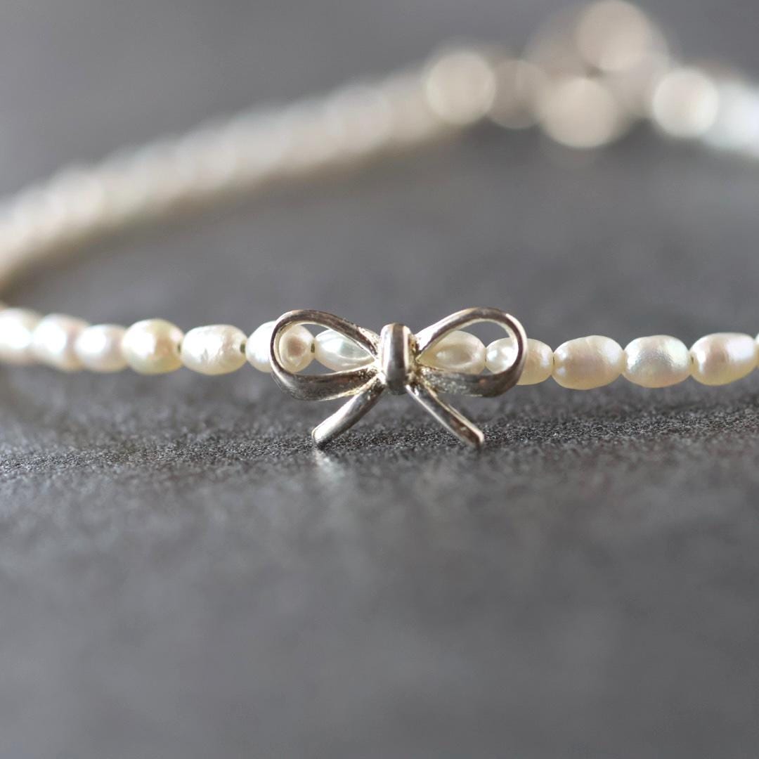 Natural Pearl Bracelet with Silver Bow Charm