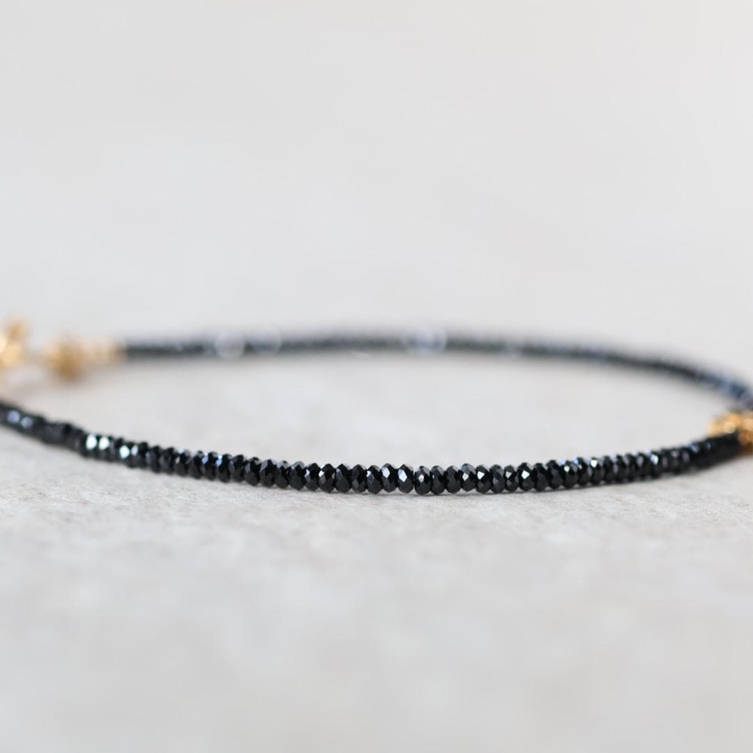 Tiny Black Spinel Bracelet with Flower Charm