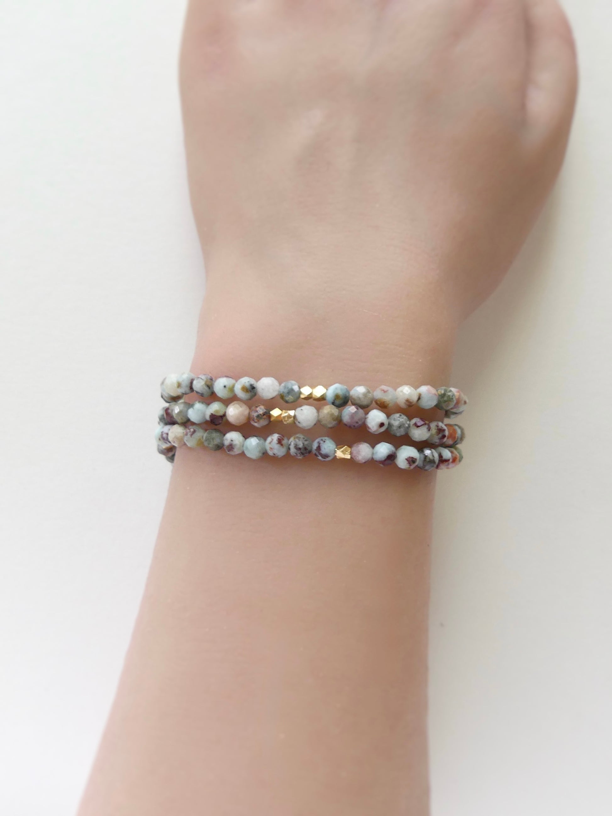 Triple wrap larimar bracelet or necklace made with 4mm faceted beads and gold vermeil accents in Caribbean ocean colors