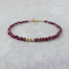 dainty garnet bracelet delicate