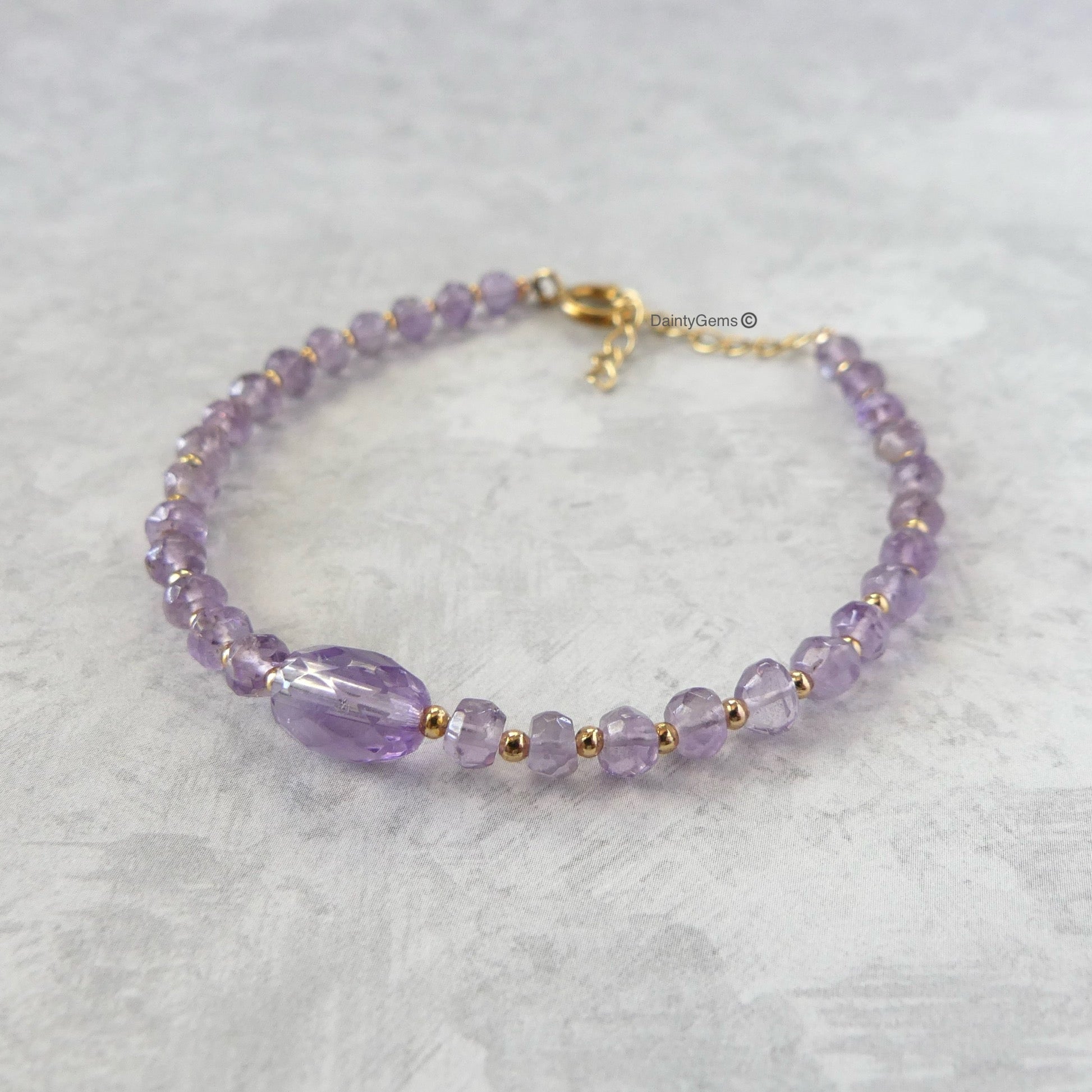 delicate pink amethyst beaded bracelet February birthstone jewelry meaningful gift unique and handmade 