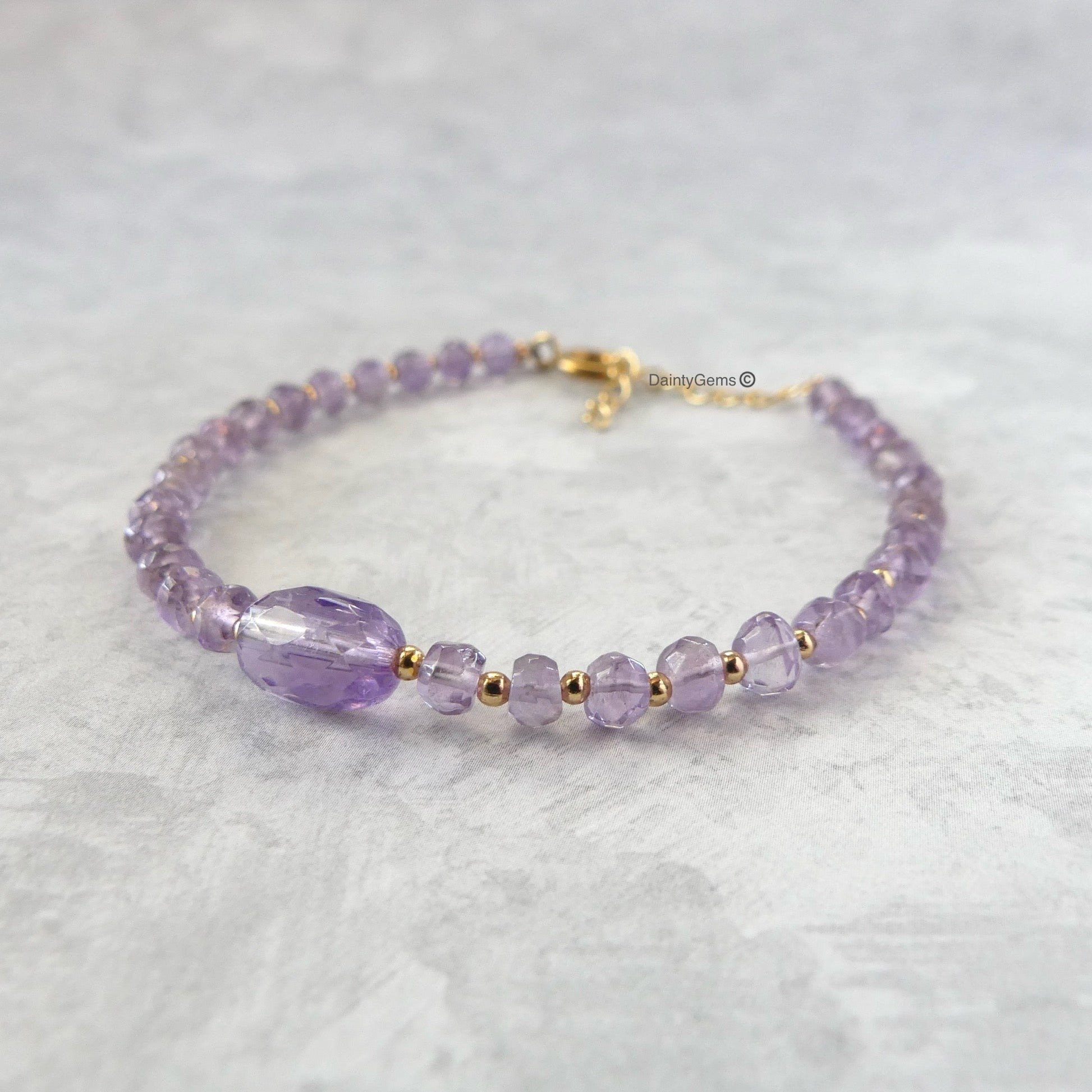 delicate pink amethyst beaded bracelet February birthstone jewelry meaningful gift unique and handmade 