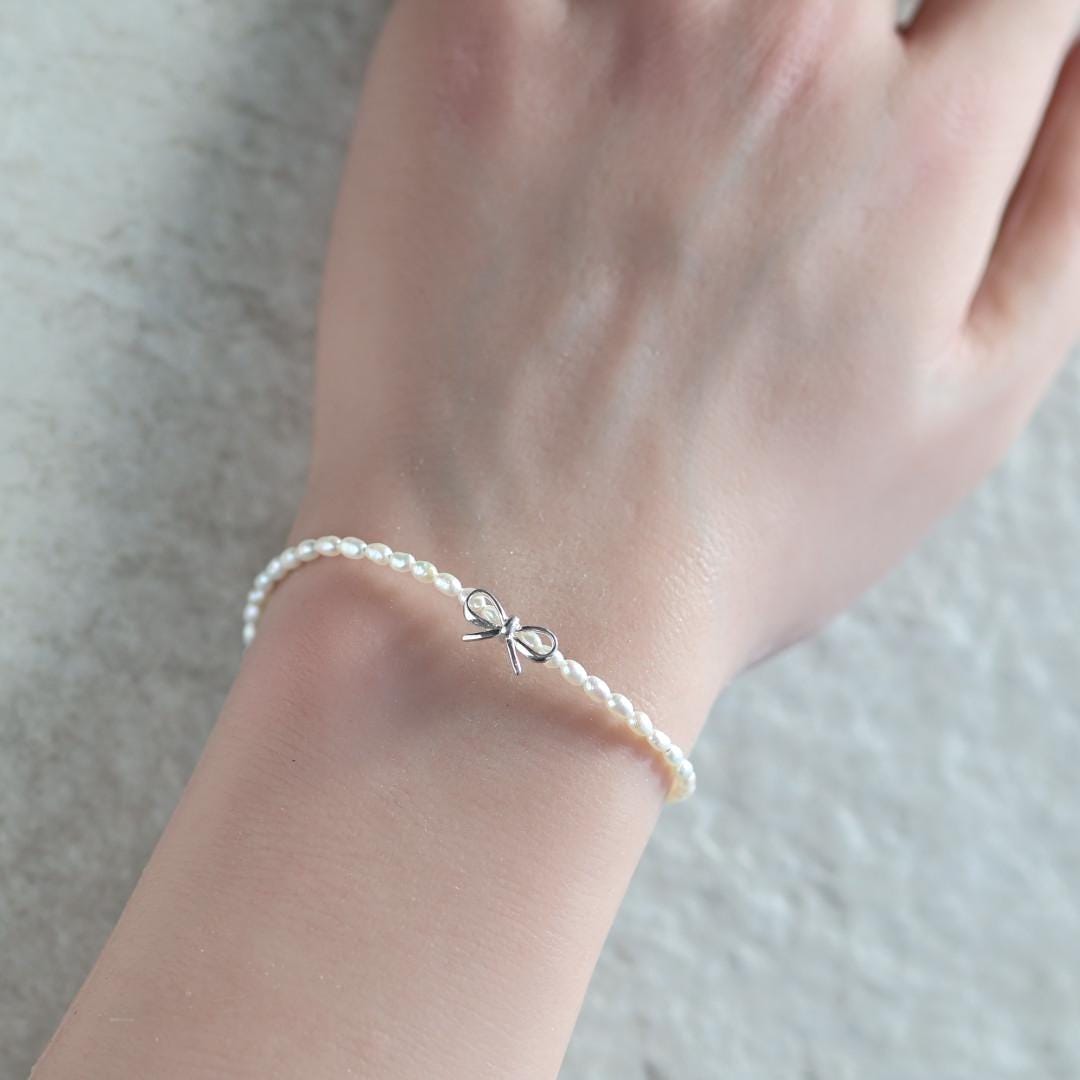Natural Pearl Bracelet with Silver Bow Charm