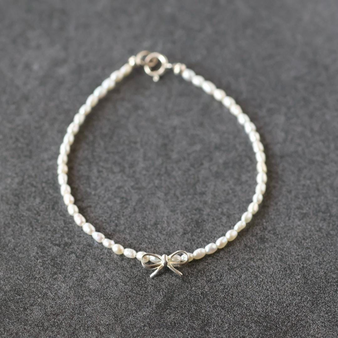 Natural Pearl Bracelet with Silver Bow Charm