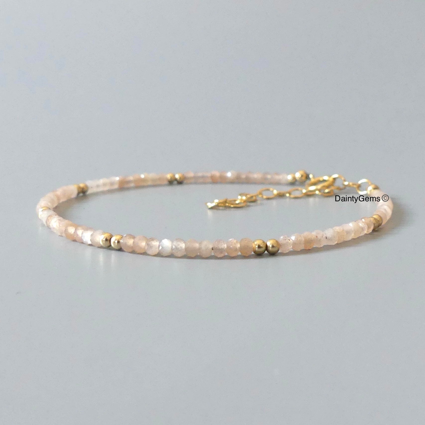 skinny peach moonstone beaded bracelet