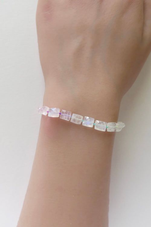 Adjustable rainbow moonstone bracelet with cube beads, hand-knotted on neon silk and finished with gold-filled extender clasp