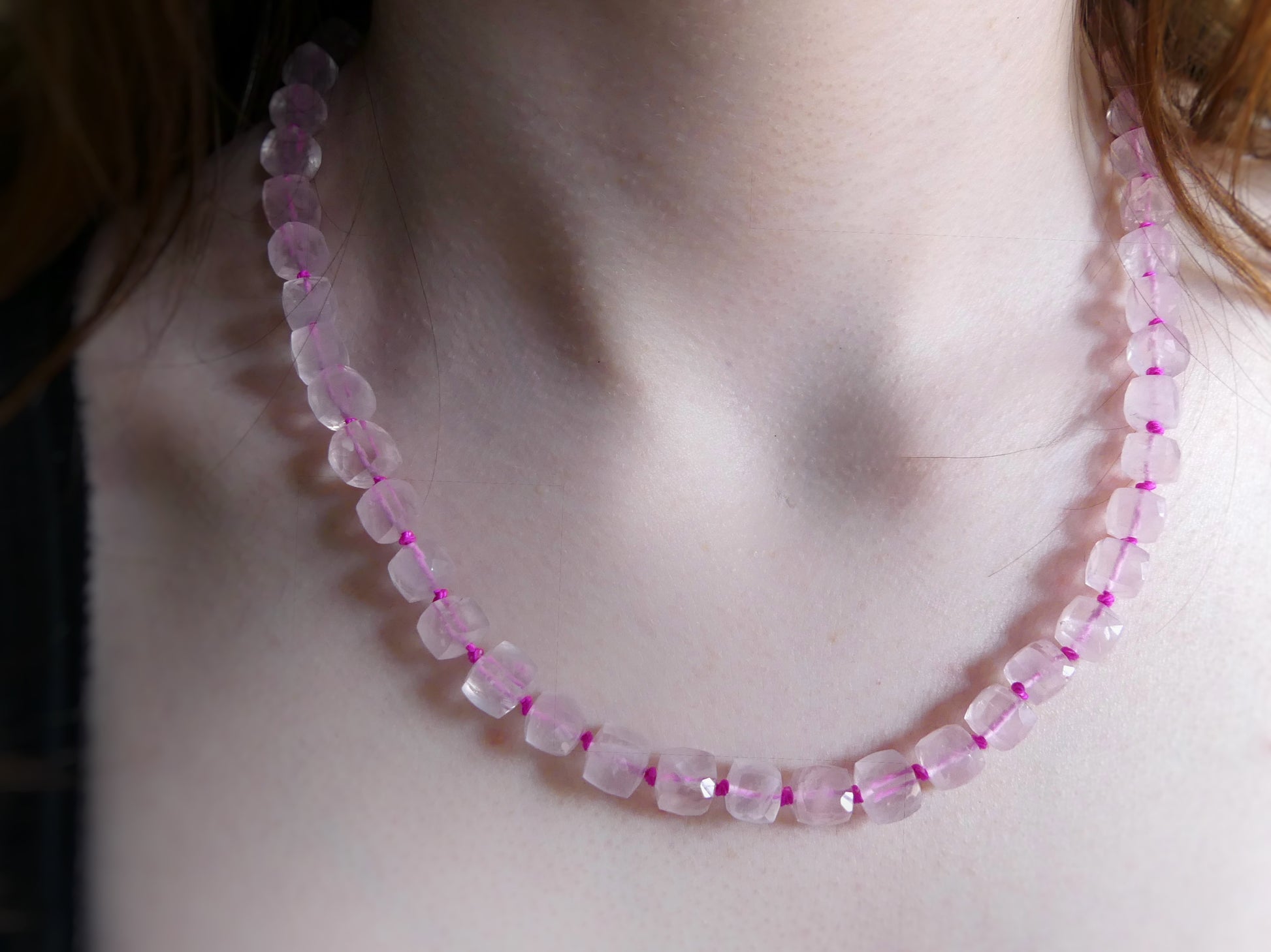18.5" rose quartz necklace made with faceted cube beads, hand-knotted on pink silk and finished with a gold-filled clasp